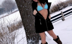 Naughty tgirl ashley george posing outdoors in the snow