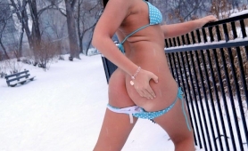 Naughty tgirl ashley george posing outdoors in the snow