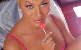 Adorable mia isabella posing  sucking a lollipop