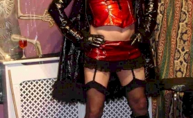 Sexy blonde tranny dressed in red pvc