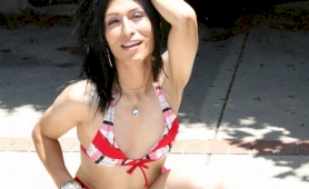 Rock hard latina tranny loses her bikini outside by the pool