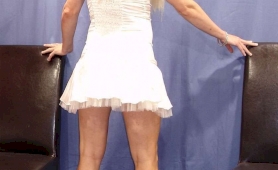 Blonde tranny in a frilly dress