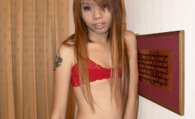 Petite ladyboy moo readying her asshole for her next client