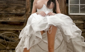 Stunning mia posing in a gorgeous wedding dress