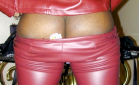 Ebony shemale in red tight leather