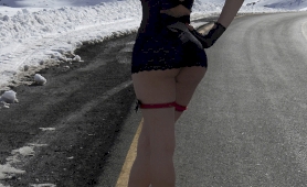 gorgeous ladyboy angeles cid frolics in the snow in lingerie
