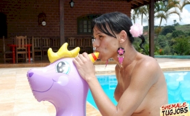 Sexy shemale playing with her cock poolside!