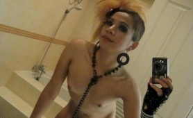 Cute femboy strips and takes pics of herself in the bathroom